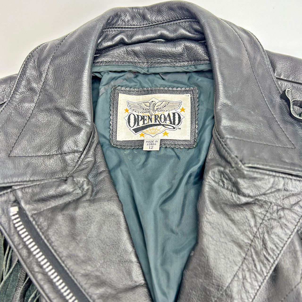 1980s Women's Open Road Black Leather Fringe Motorcycle Jacket Size 12
